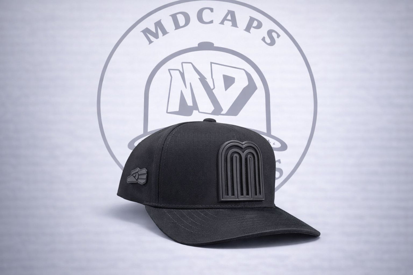 M CAPS